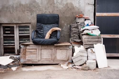 Professional home clearance staff removing items from a household